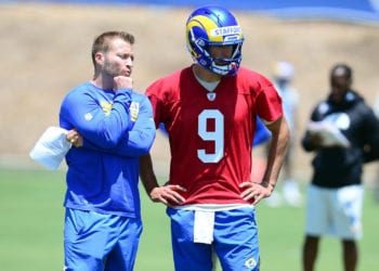 May 27, 2021; Thousand Oaks, CA, USA; Los Angeles Rams head coach Sean McVay speaks with quarterback Matthew Stafford (9) during oraganized team activities.  Mandatory Credit: Gary A. Vasquez-USA TODAY Sports